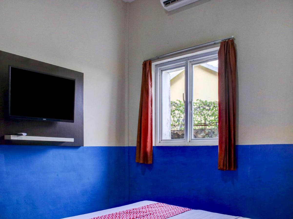 Oyo 90162 Remboelan Guest House Sungai Lutus Exterior foto